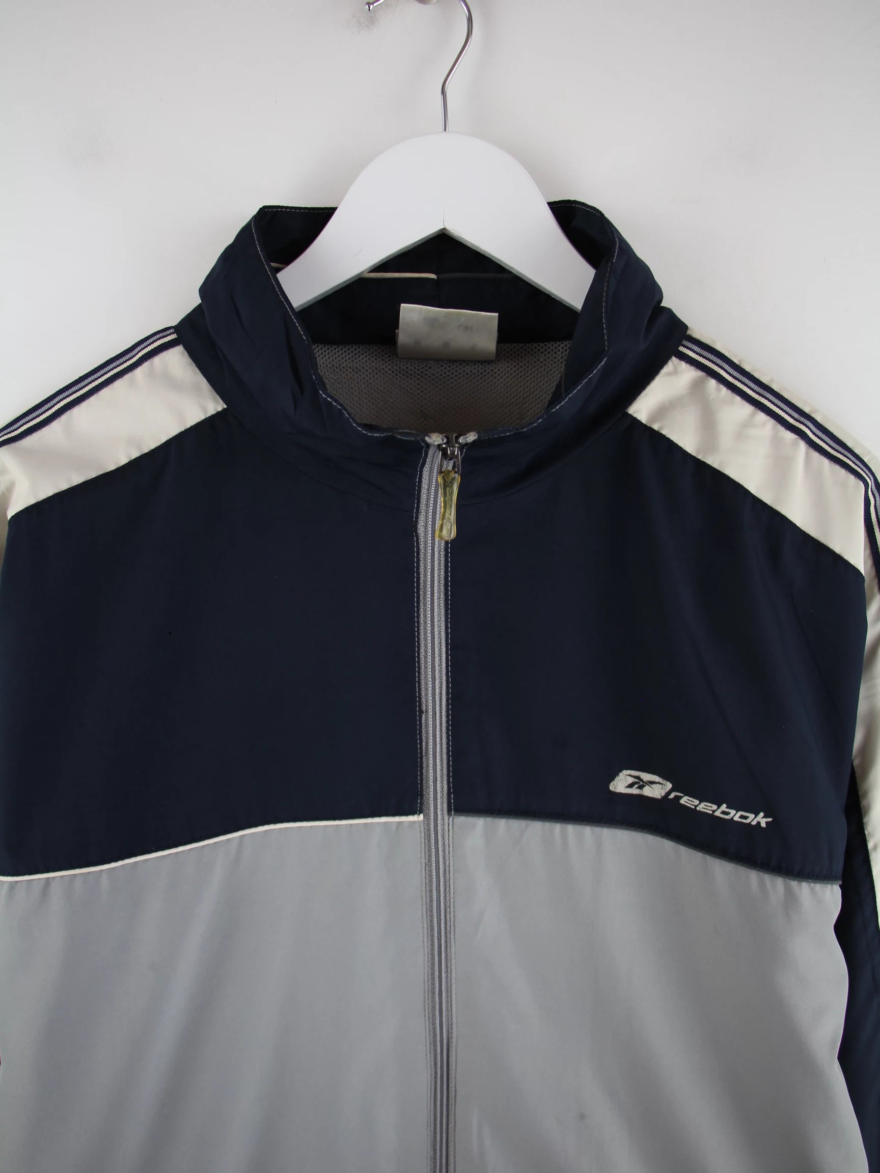 Reebok Trainingsjacke Mehrfarbig L – Detailansicht Vorderseite