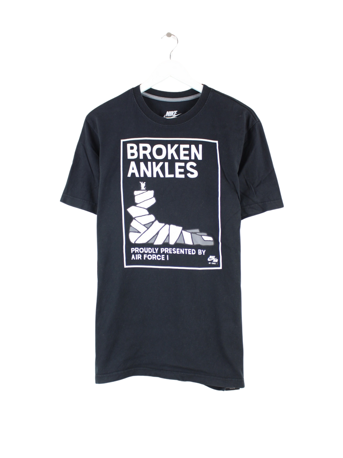 broken nike tee