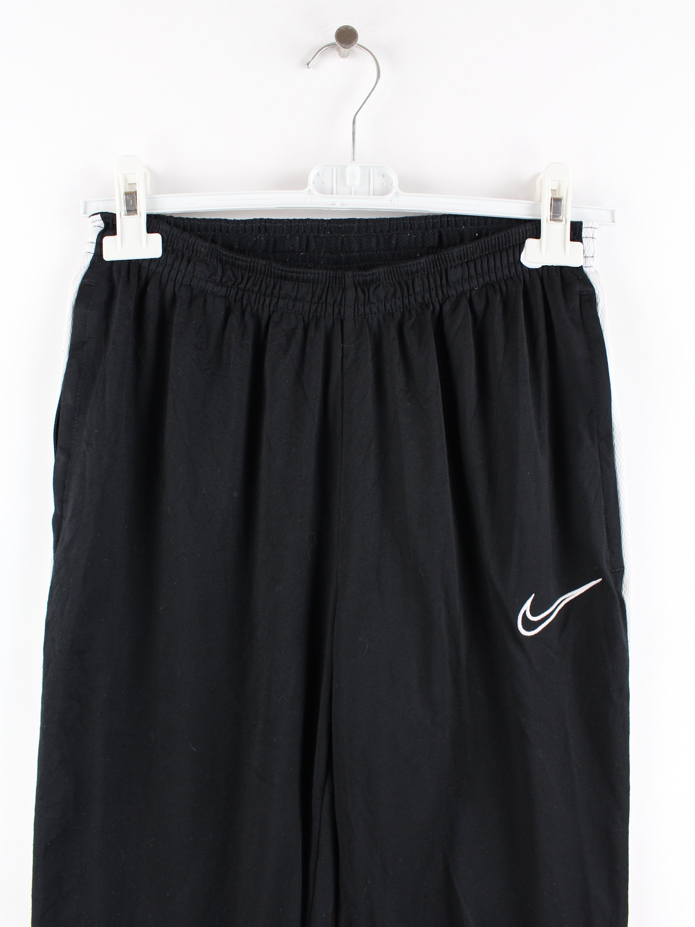 nike track pant shorts