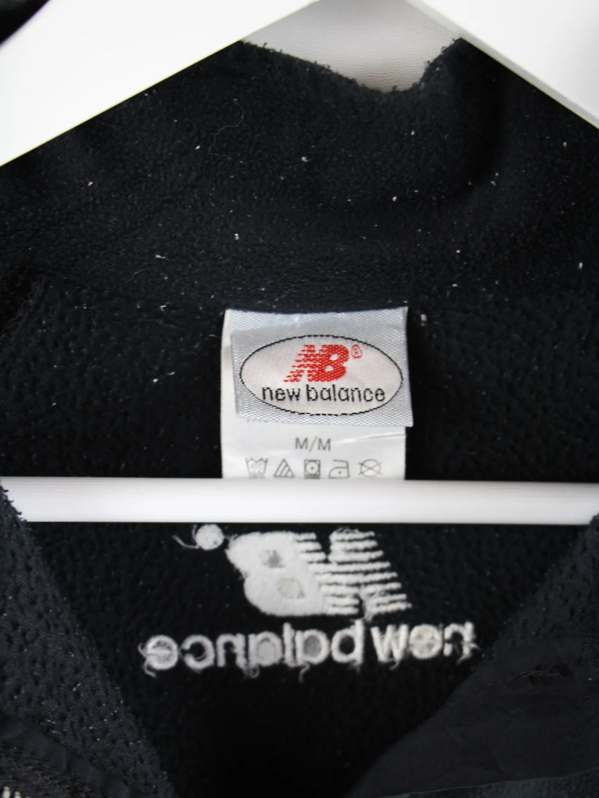 New Balance Fleece Schwarz M – Etikett