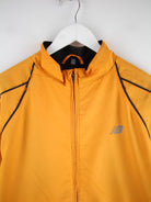 New Balance Leichte Jacke Orange M – Detailansicht Vorderseite