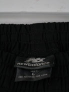 New Balance Track Pants Schwarz L – Etikett