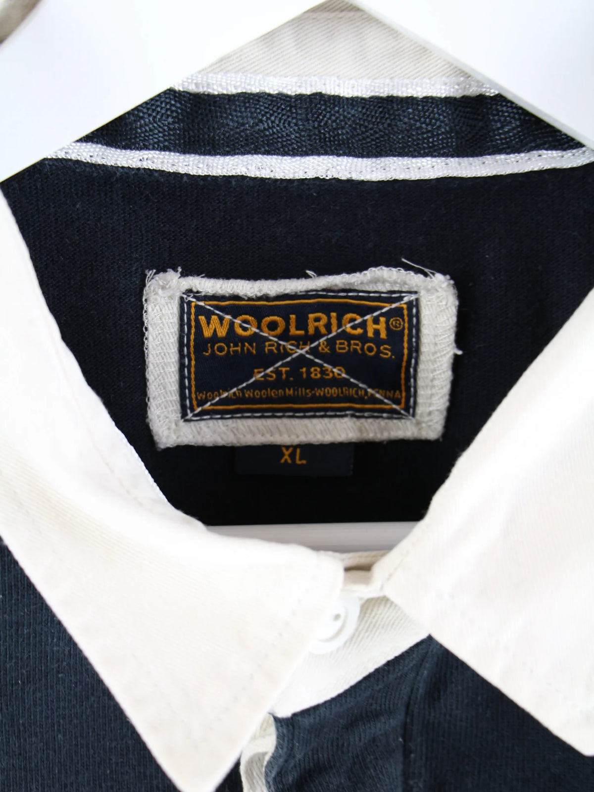 Woolrich Polo Schwarz XL – Etikett